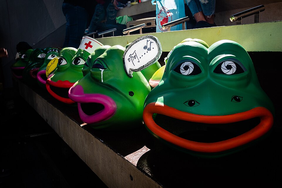 Pepe the Frog masks worn by pro-democracy demonstrators in Hong Kong, 2019 — the frog adopted as a protest symbol with no connection to its American baggage.